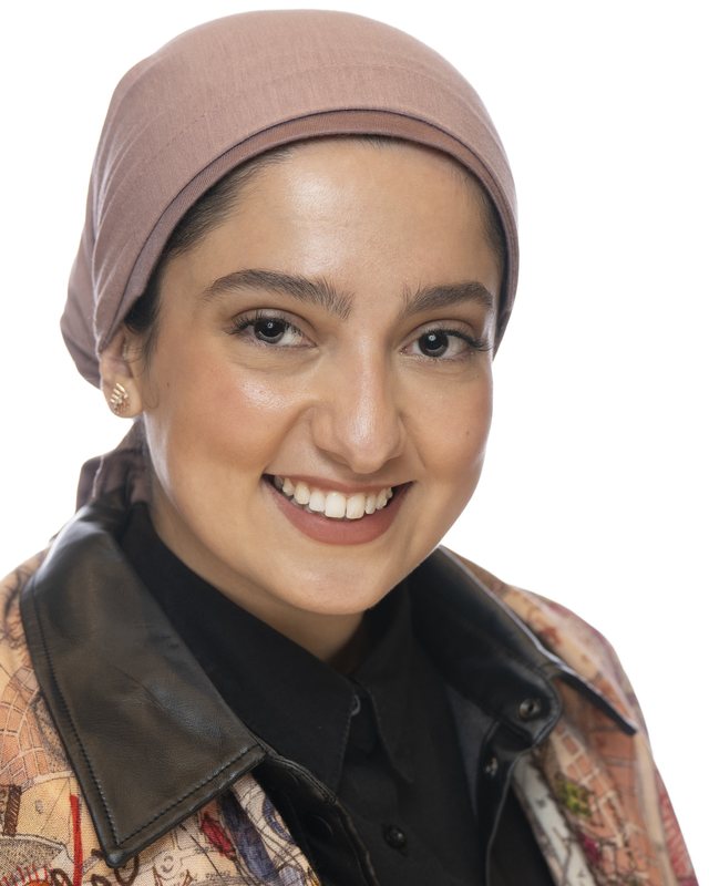 Corporate headshot on a white backdrop, shot at a Fate Media Creative booth